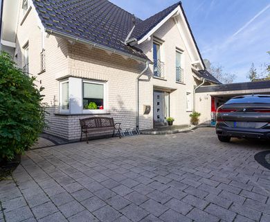 Groß, elegant und hochmodern:
Weiß verklinkerter Haustraum in Hamm Braam-Ostwennemar!