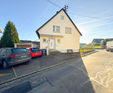 Freistehendes Einfamilienhaus mit Garten und Garage in ruhiger Lage in Hahn am See!
