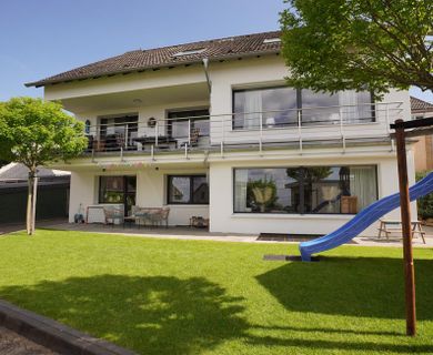 Miet-Kaufoption – Auf Neubauniveau-modernisiertes Dreifamilienhaus in ruhiger Wohnlage