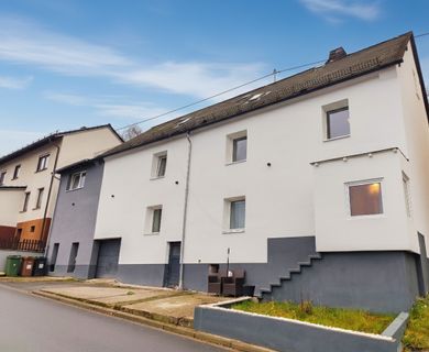 Massiv gebautes Doppelhaus mit Garten, Terrasse und Erweiterungspotenzial!