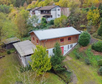 Vielseitig nutzbare Gewerbeimmobilie auf großem Grundstück – ehemalige Feuerwehr