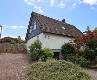 Wohnen in Burscheid: Bezahlbares Einfamilienhaus (Fertighaus) mit Baugrundstück