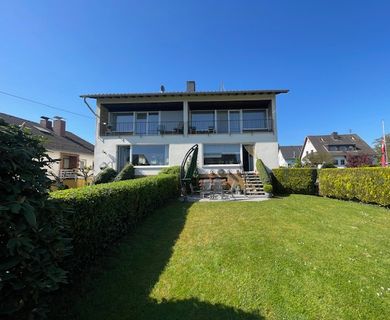 2 auf einen Streich: Vermietetes Doppelhaus, je mit Garten  und  Garage -1 Einheit wird frei