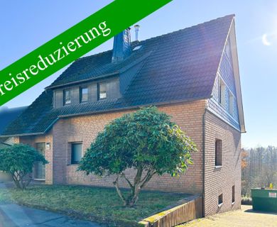 Renovierungsbedürftiges Zweifamilienhaus mit großem Garten in ruhiger Ortsrandlage von Morsbach!